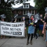 Sunrise activists demonstrate in front of Mitch McConnell's KY house, holding a large sign saying "Breonna Couldn't Sleep. Neither Should Mitch".