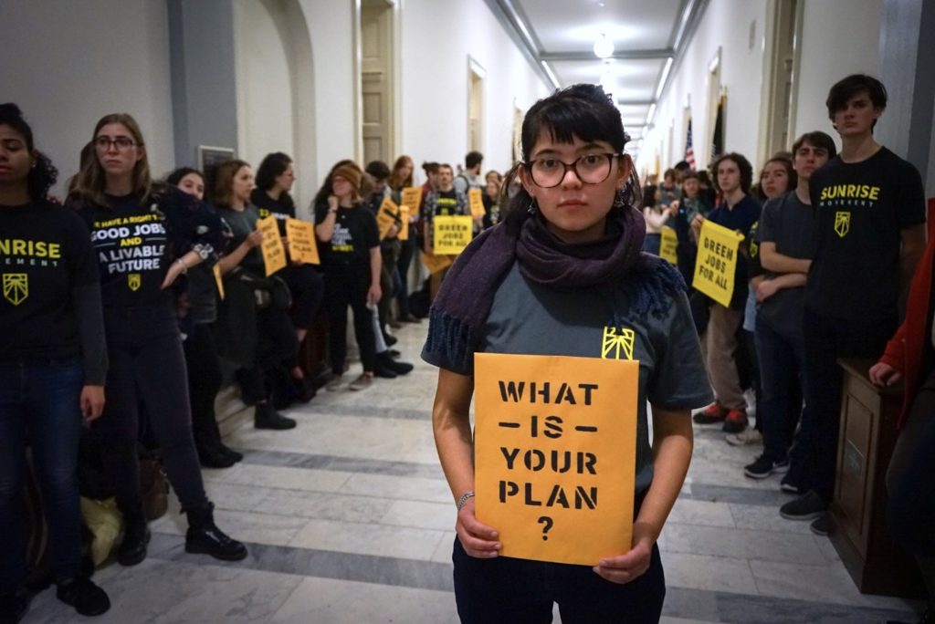 Sunrise Movement Holding What is Your Plan Sign