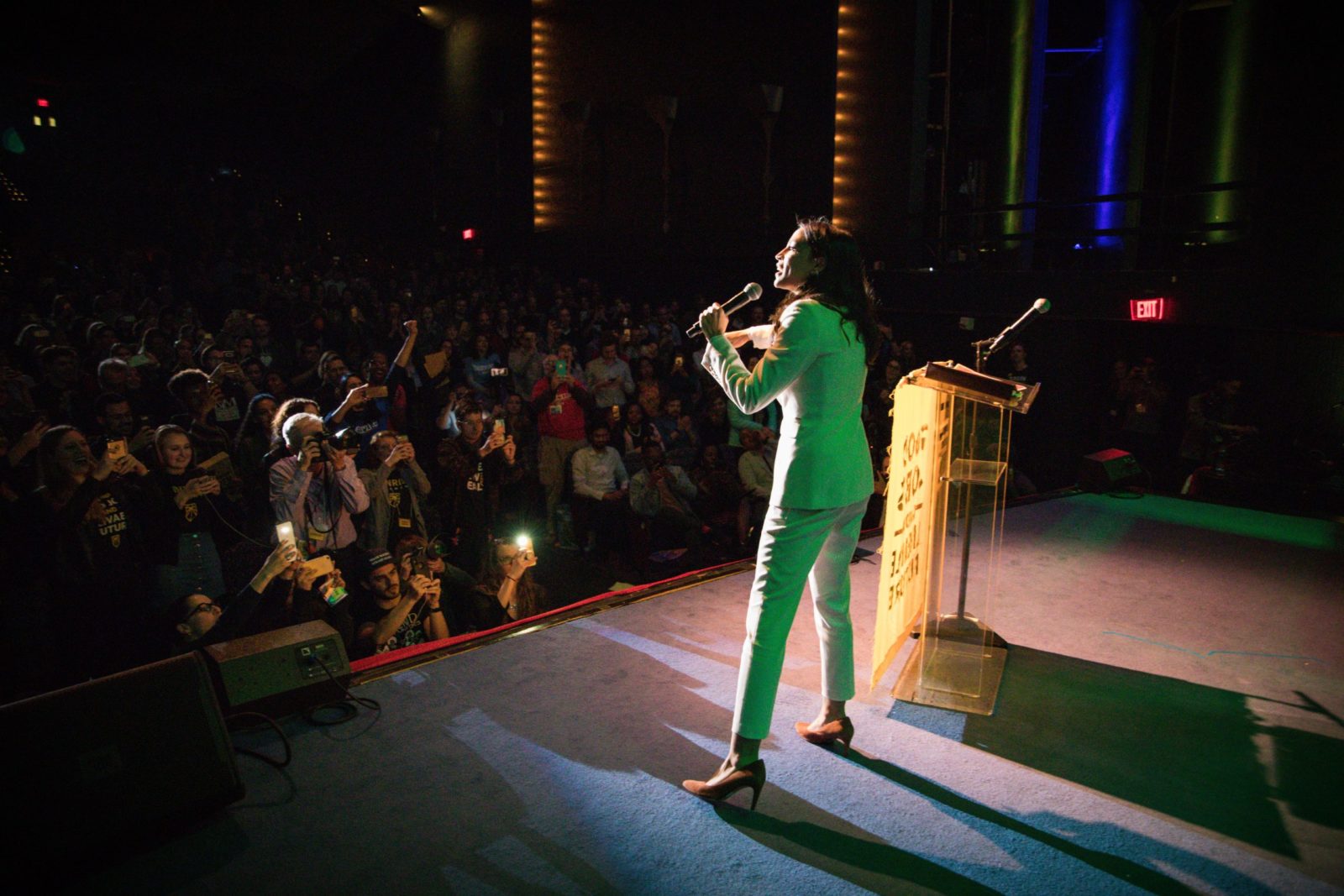 AOC facing away from addressing the crowd during the GND tour