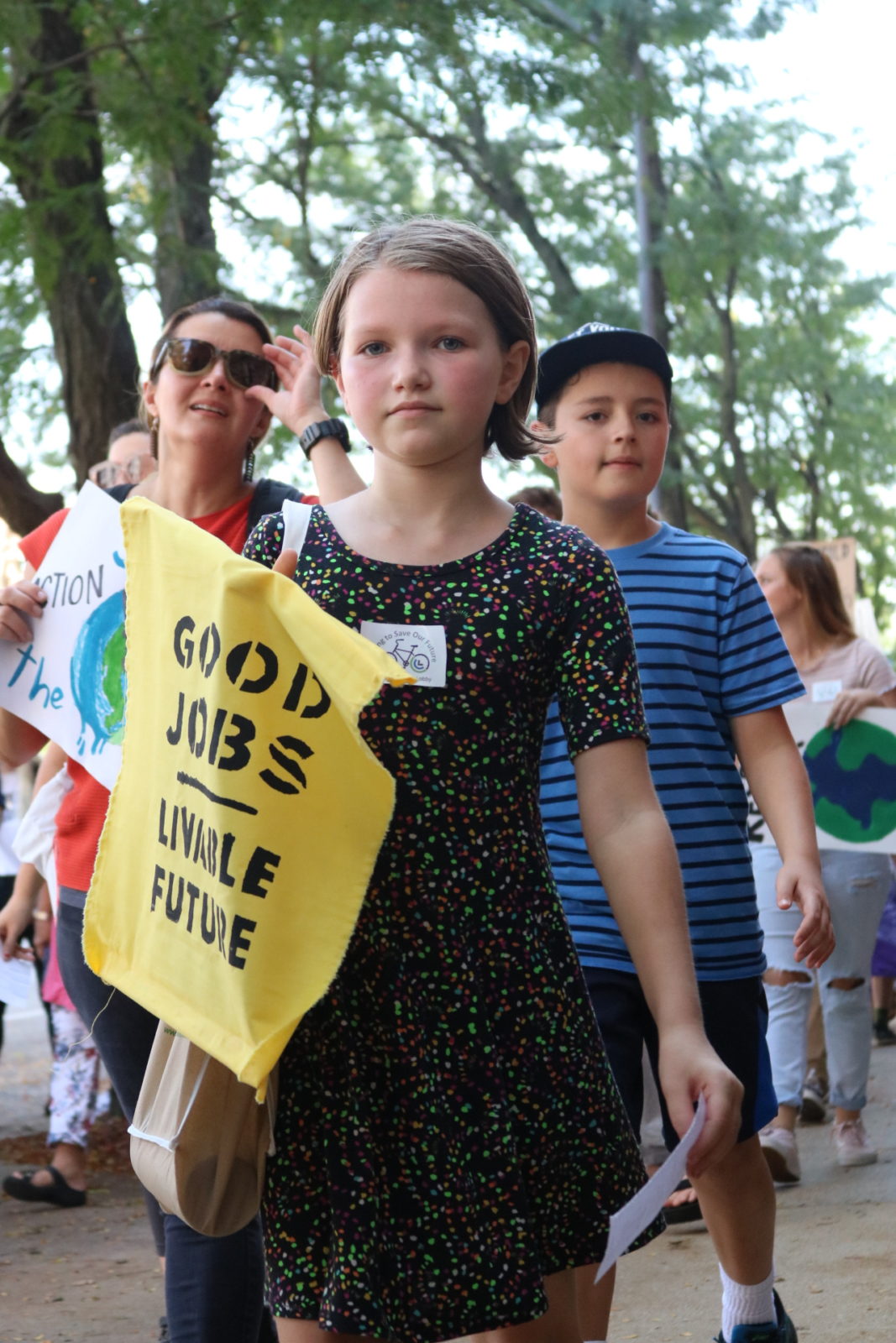 A young activist holds a sign saying "Good jobs, livable future" during the September 2019 Climate Strike.